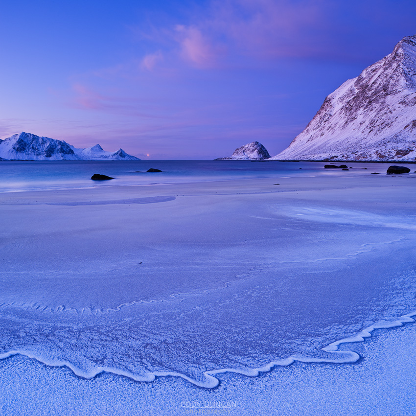 Frozen tide at Haukland beach in winter, Vestvagøy, Lofoten islands, Norway