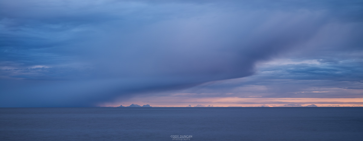 Approaching winter storm conceals Norwegian mainland across Vestfjord, Moskenesøy, Lofoten Islands, Norway
