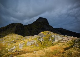 Dramatic clouds over summit of Hermannsdalstinden, Moskenesoy, Lofoten Islands, Norway