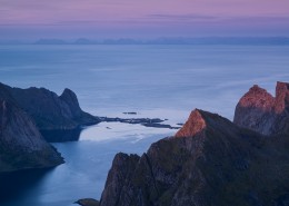 Moon rises over Vestfjord and Moskenesoy from summit of Hermannsdalstind, Lofoten Islands, Norway