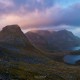 Evening light over Branntuva and surrounding mountain landscape from the summit of Markan (602m), Moskensøy, Lofoten Islands, Norway