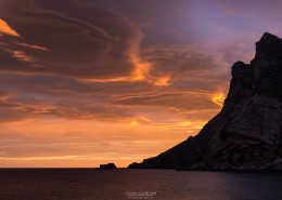 Colorful sunrise over mountains at Bunes Beach, Moskenesoy, Lofoten Islands, Norway