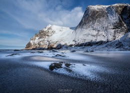 Frozen sand of Bunes beach in winter, Moskenesøy, Lofoten Islands, Norway