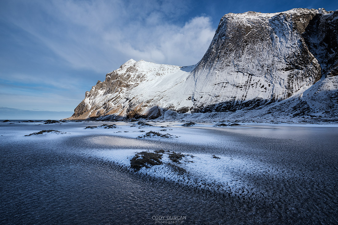 Frozen sand of Bunes beach in winter, Moskenesøy, Lofoten Islands, Norway
