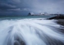 Rocky coastline of Flakstadøy overlooking Nappstraumen, Lofoten Islands, Norway