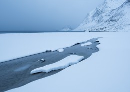 Snow covered Haukland beach in winter, Vestvågøy, Lofoten Islands, Norway