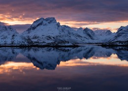 Winter sunset over mountain of Moskenesøy from Fredvang bridges, Lofoten Islands, Norway